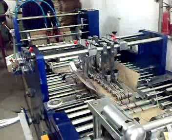 伊寧國標(biāo)品質(zhì)塑料制品 手機(jī)貼膜紙卡、紙袋與包裝盒制造機(jī)器一站式解決方案